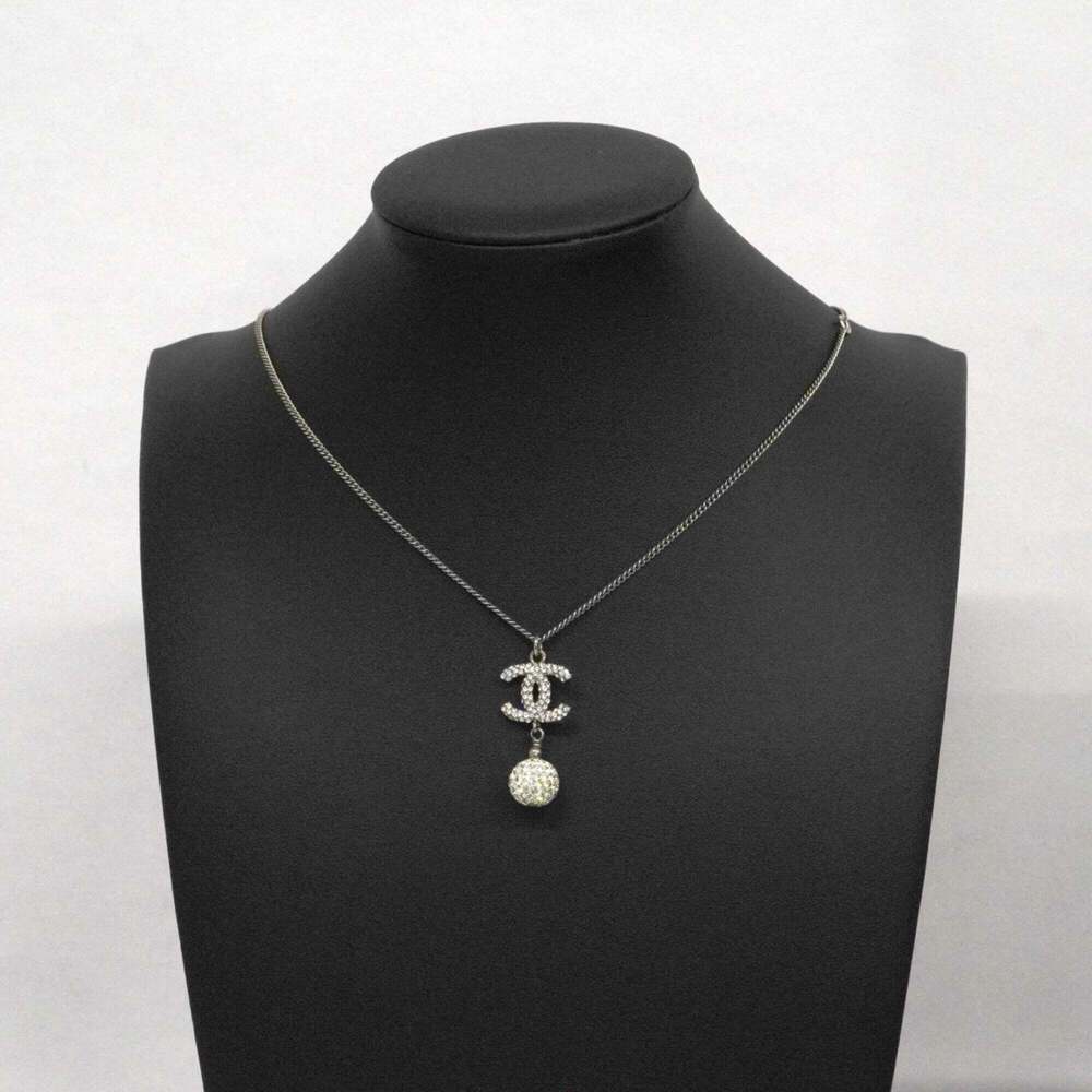 CHANEL Authentic Silver Logo Necklace - Picture 6 of 7
